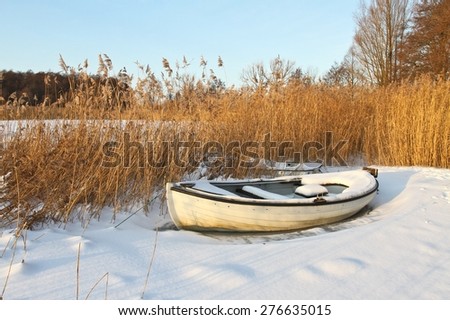 Boats at the lake in winter in Denmark
