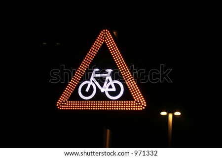 bike warning sign in the night