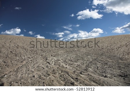 desert ground under  summer sky with nice cloud formation