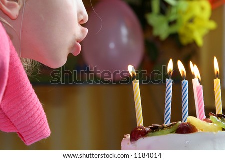 Blowing birthday candles