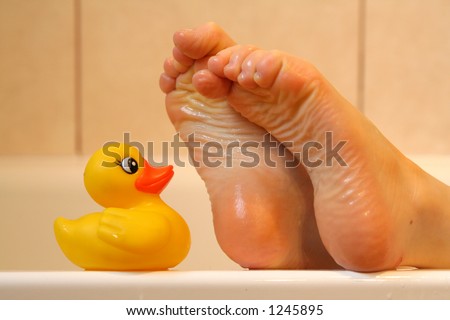 Feet taking with bath duck