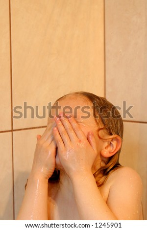 stock photo Little girl under shower