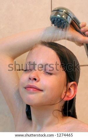 stock photo Young girl taking shower