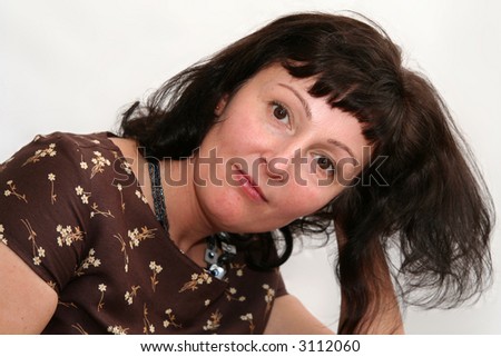 stock photo Portrait of a beautiful brunette mature woman