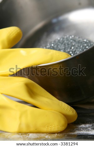 Metal pot cleaning with  wire wool and powder