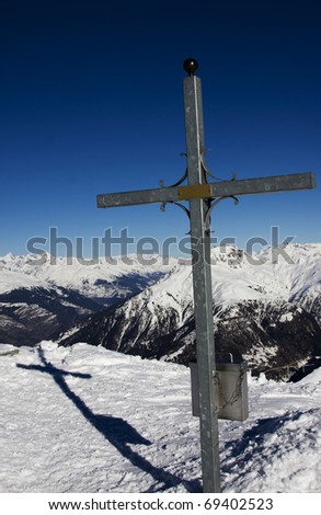 cross on the top of spitzhorli in switzerland