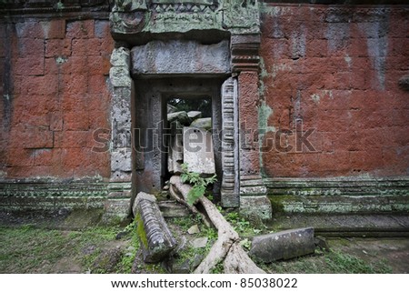 old door in the ruins at angkor in cambodia
