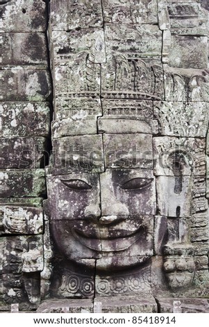 face made of stone in angkor in cambodia