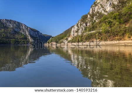Danube Gorges reflecting in the Danube River, Romania.