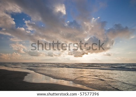 blue sky filled with clouds over the sea