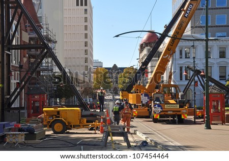 CHRISTCHURCH, NEW ZEALAND - MARCH 09: It\'s a hive of activity in Worcester street where workers are trying to stabilize earthquake damaged heritage buildings on March 09, 2011 in Christchurch.