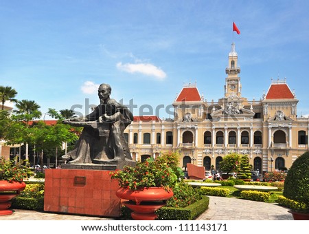HO CHI MINH CITY, VIETNAM - JUNE 08: Statue of Vietnam\'s revered leader Ho Chi Minh (also called Uncle Ho or Bac Ho) in front of The Peoples\' Committee building on June 08, 2011 in Ho Chi Minh Square.