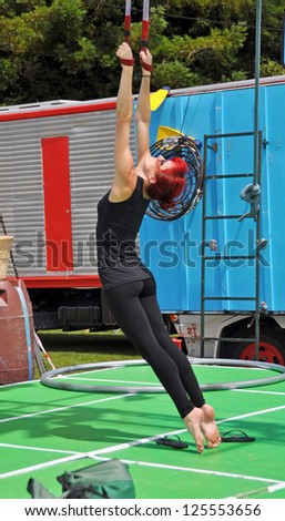 CHRISTCHURCH, NEW ZEALAND - JANUARY 21: Fuse Circus performer practicing before the Campground Chaos show at the 20th World Buskers Festival on January 21, 2013 in Christchurch.