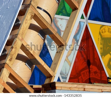 CHRISTCHURCH, NEW ZEALAND - JUNE 23, 2013: Christchurch Earthquake Rebuild - New stained glass windows are installed in the Cardboard Cathedral in Latimer Square on June 23, 2013 in Christchurch.