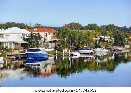 NOOSA, AUSTRALIA - JULY 05, 2009: The canals in beautiful Noosa Waters, Sunshine Coast, Queensland. Where you can tie up your boat on the jetty right next to your house.