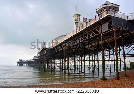 Brighton, United Kingdom - September 30, 2014: View of Brighton Pier from underneath including steel piles and structure.
