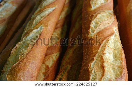 Close-up View of a stack of Crisp Fresh Baked French Bread Sticks.