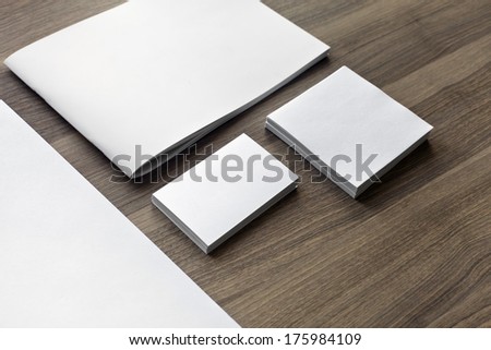 Blank stationery set on wood background / a4 paper, business cards, booklet, sheets, etc