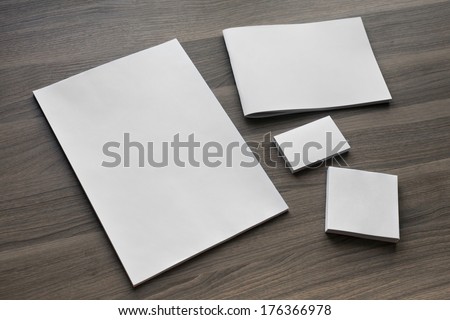 Blank stationery set on wood background / a4 paper, business cards, booklet, notepad and etc