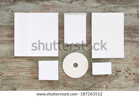Blank stationery set on wood background / business cards, booklet, notepad, CD