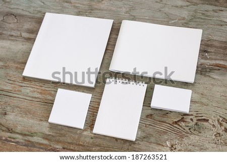 Blank stationery set on wood background / business cards, booklet, notepad