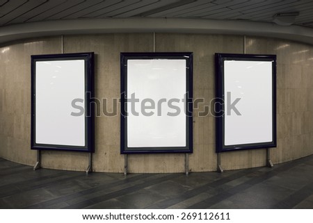 Realistic photo blank billboard in metro station (Prague, Czech Republic), with the texture of the poster and highlights