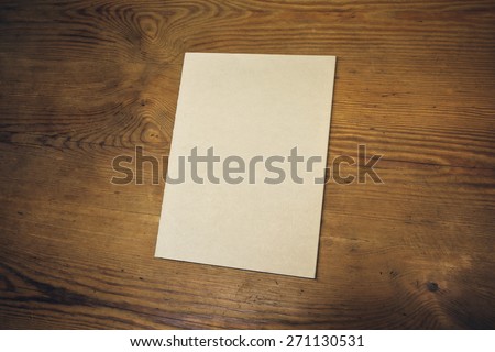 Photo blank. Cover brochure on the wooden background. Vintage style