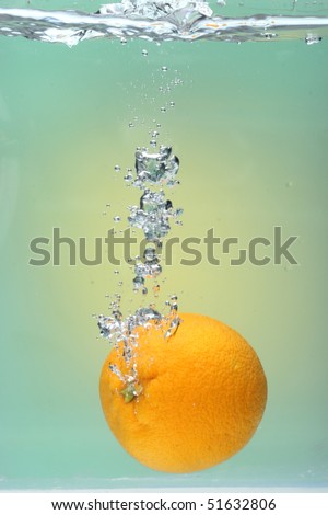 Orange Splash on green background