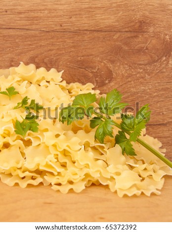 pasta on an old wooden table in a dark old kitchen service
