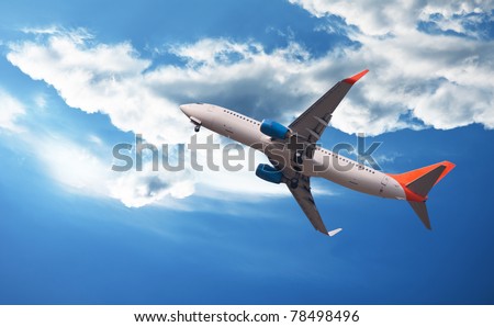 The plane flies through clouds