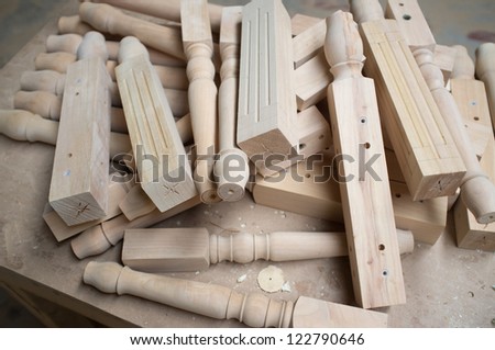 A pile of wood parts
