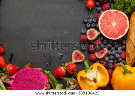 Vegetables and fruits, on the black background board