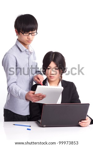 The two Asian white-collar, working on the computer side