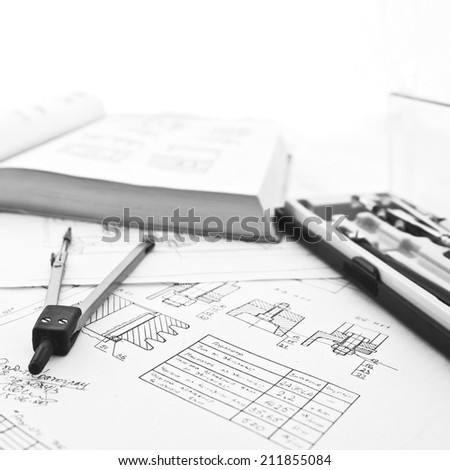 Blueprints, design, reference book,  rubber, pair of compasses and other drawing instruments isolated on white background. Monochrome colors picture.