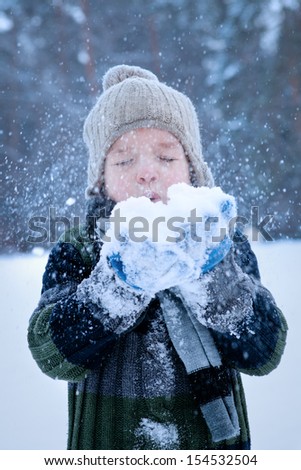 Portrait of child wearing scarf, winter