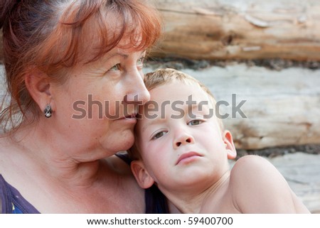 Portrait of a grandmother and grandson.