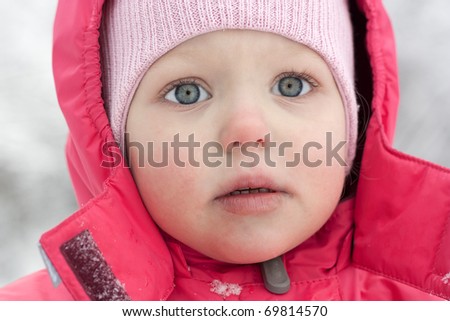 Portrait of  girl in pink, winter.