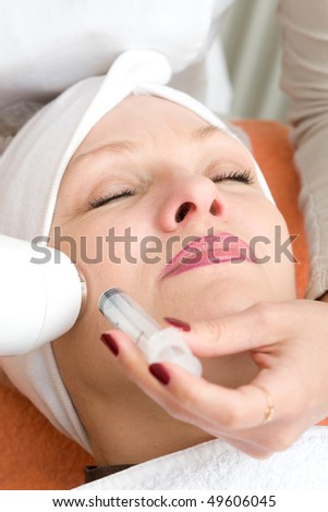 Medical cosmetic operation make on women face by ultrasound