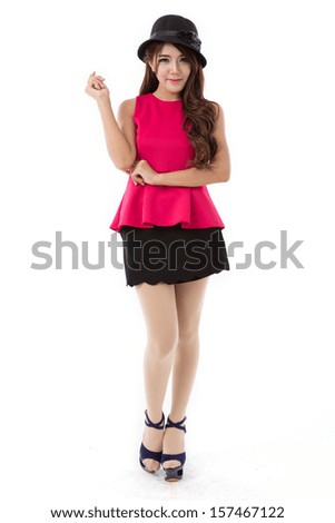 Beautiful young asian woman  full body posing in in red blouse, black skirt with hat  isolated on white background.
