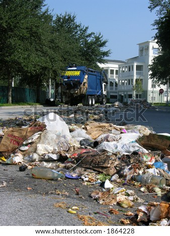 garbage truck malfunction causes refuse to be spread for blocks through upscale neighborhood