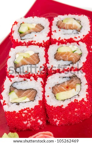 Tobiko Spicy Maki Sushi - Hot Roll with various type of Tobiko (flying fish roe) outside. Salmon, avocado and Green Lettuce inside