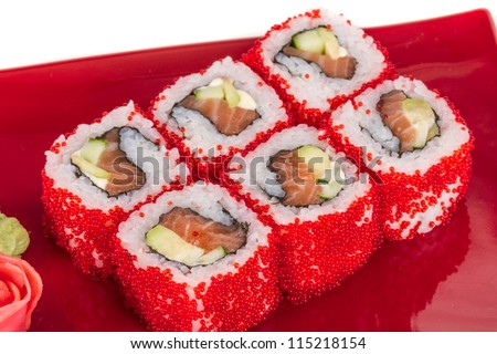 Tobiko Spicy Maki Sushi - Hot Roll with various type of Tobiko (flying fish roe) outside. Salmon, avocado and Green Lettuce inside