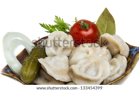 Bowl with traditional russian dish - pelmeni (dumplings)