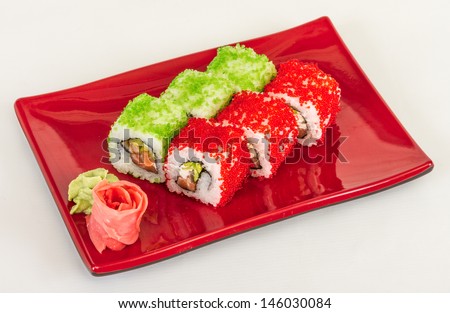 Tobiko Spicy Maki Sushi - Hot Roll with various type of Tobiko (flying fish roe) outside and salmon inside
