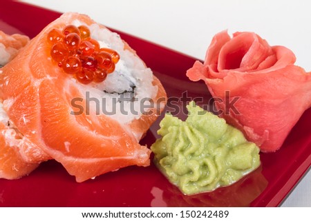 Japanese sushi traditional japanese food.Roll made of salmon, red cavair, roe and cream