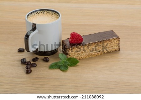 Coffee with cake and raspberry