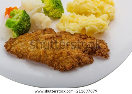 Schnitzel with mash potato and cabbage