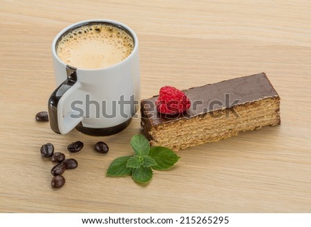Coffee with cake and raspberry