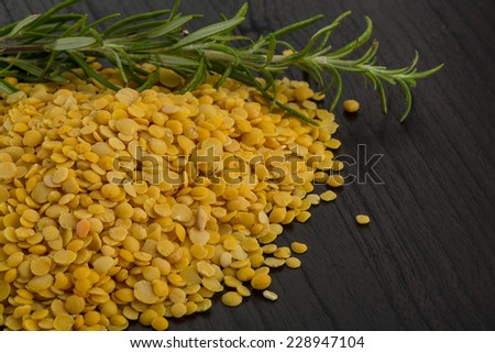 Raw yellow lentils with herbs