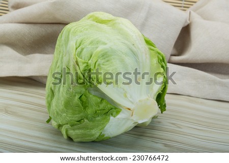 iceberg salad - on the wooden background